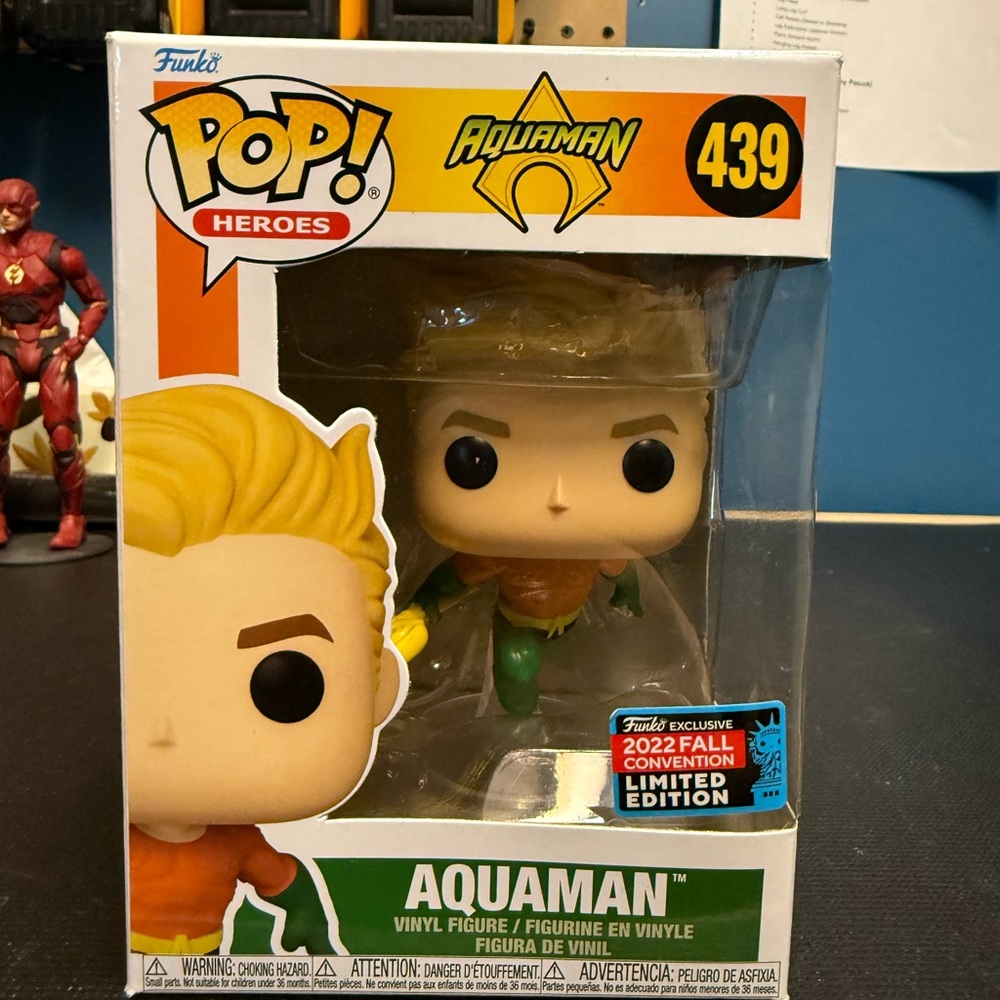 Funko Aquaman Figure with Blonde Hair and Green Suit